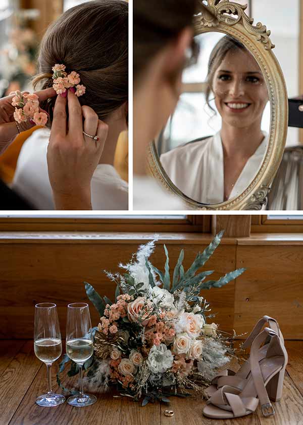 Details der Boho Braut: Brautstrauß mit Wildblumen, zarte Schuhe in Rosé und sanftes Make-Up.